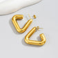 Radiant Triangle gold earrings