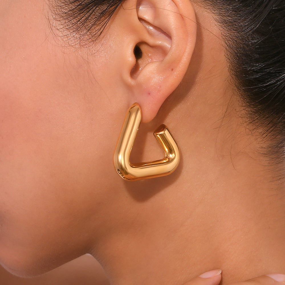 Radiant Triangle gold earrings